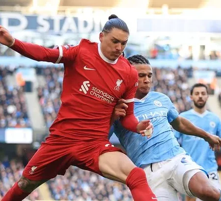 Liverpool and Manchester City Share Spoils in Thrilling 1-1 Draw