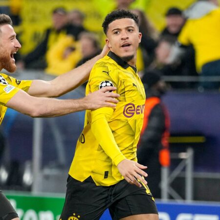 Jadon Sancho and Marco Reus Propel Borussia Dortmund to Champions League Quarter-Finals with 2-0 Victory Over PSV Eindhoven